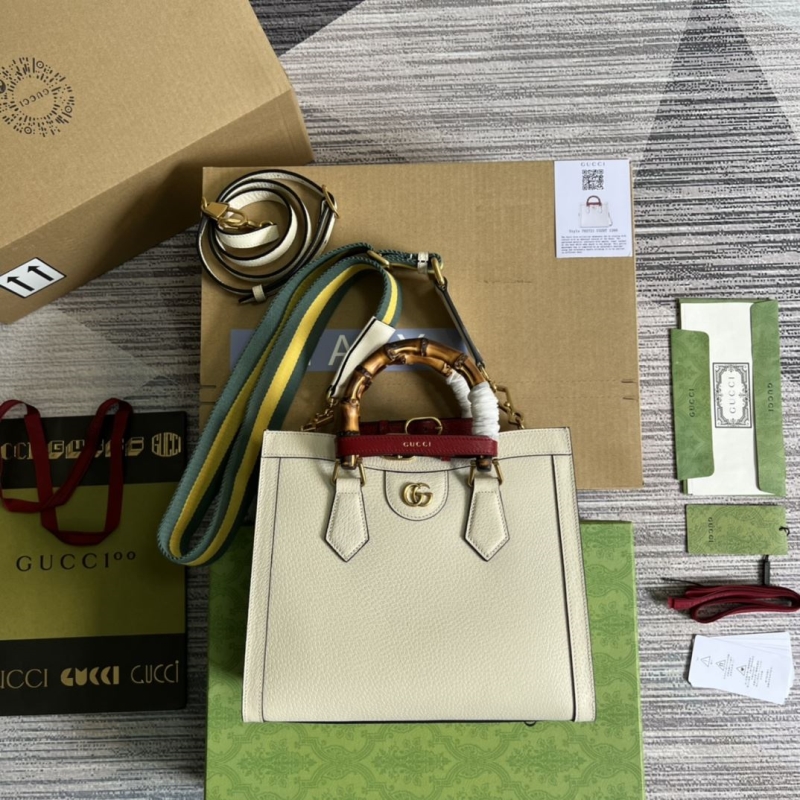 G*u*i top handle bags